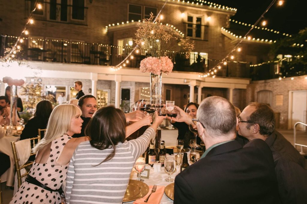 Molly-and-Joes-wedding-guest-toasting-at-table
